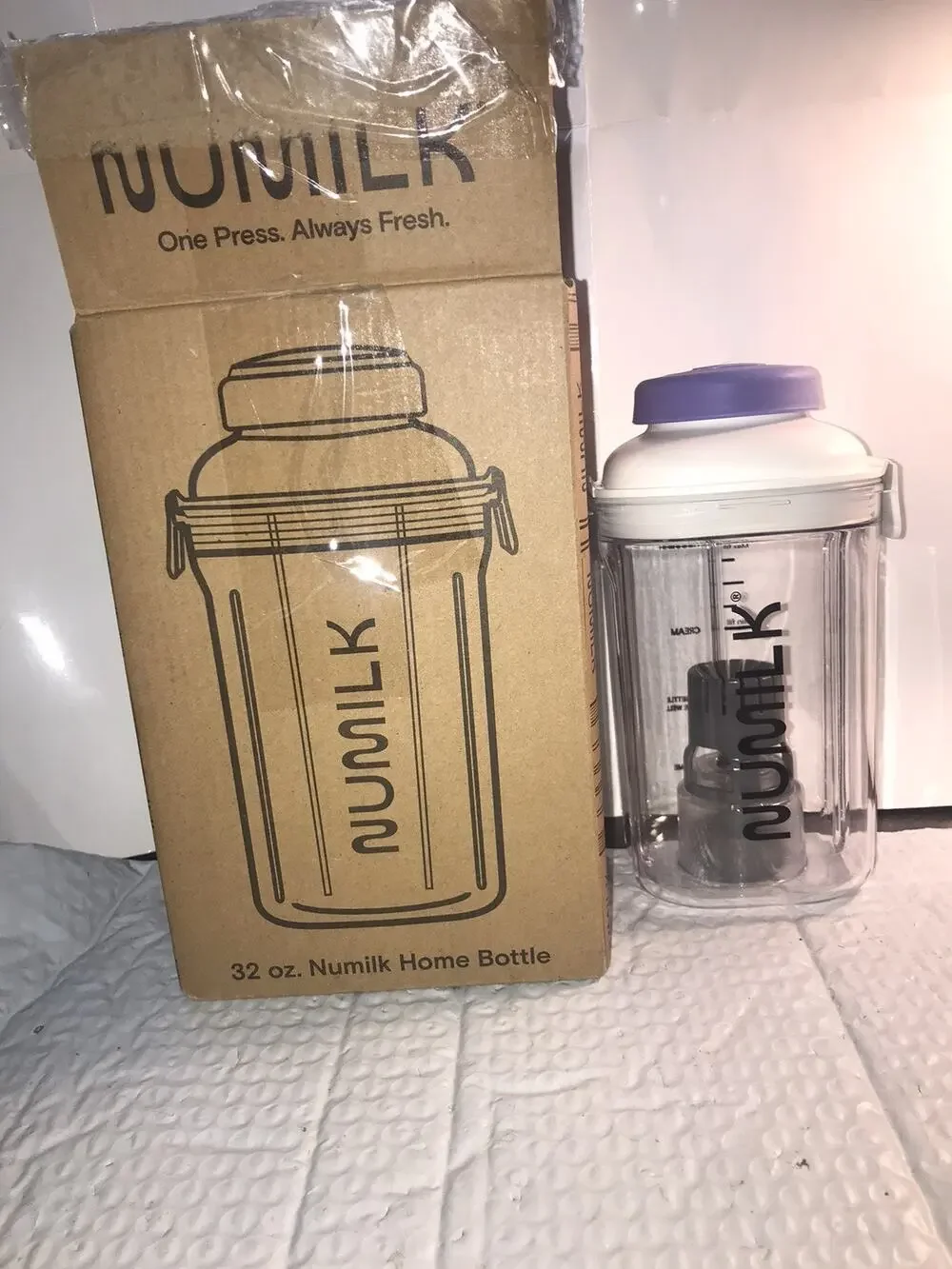 Numilk 32 oz. Accessory Bottle with Silicone-Sealed Lid, Dishwasher Safe,
